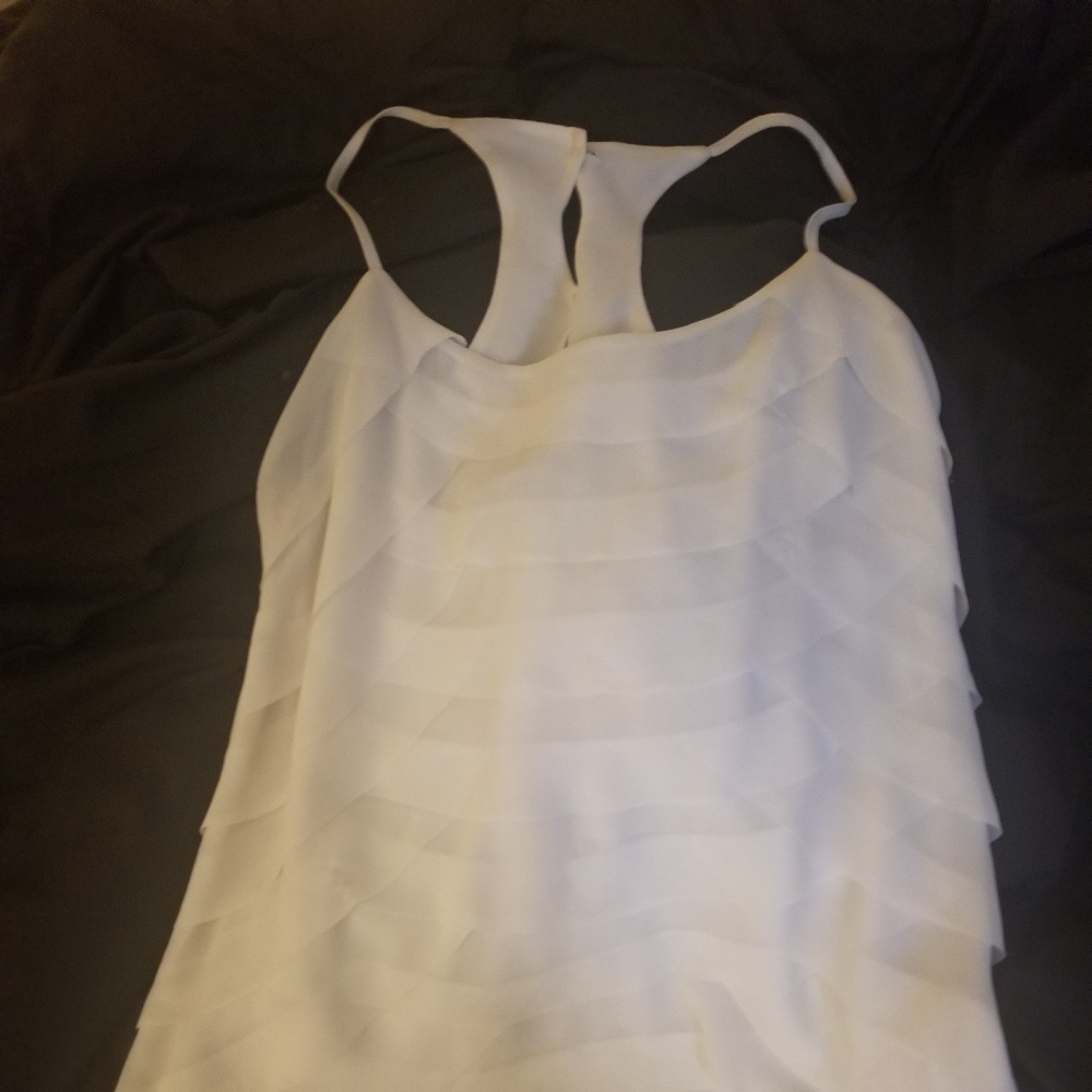 Scalloped white top with details